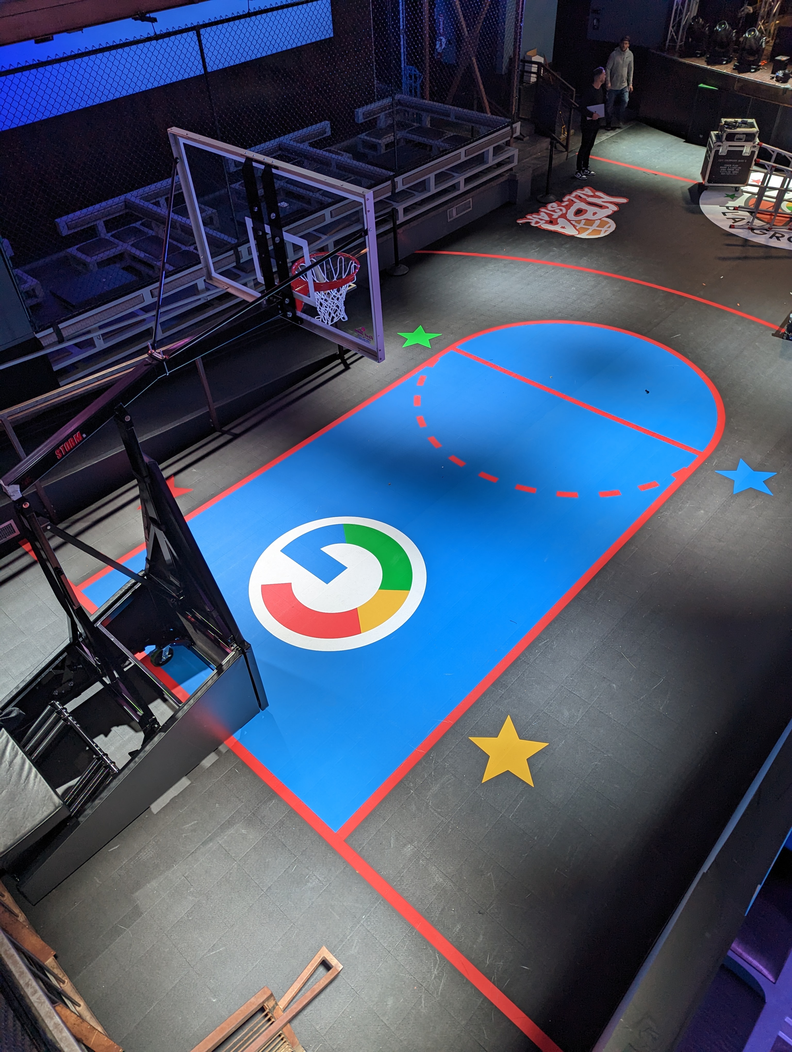 Overhead view of the Google Pixel basketball court and NBA All Star Weekend from behind the goal.
